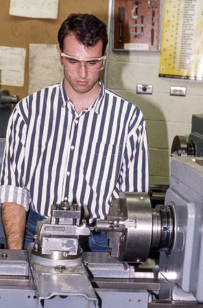 Student works alongside teacher in Manufacturing Technology. January 1990.