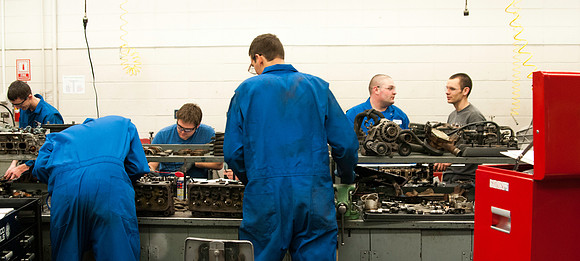 students working in the Auto lab of the austin building
