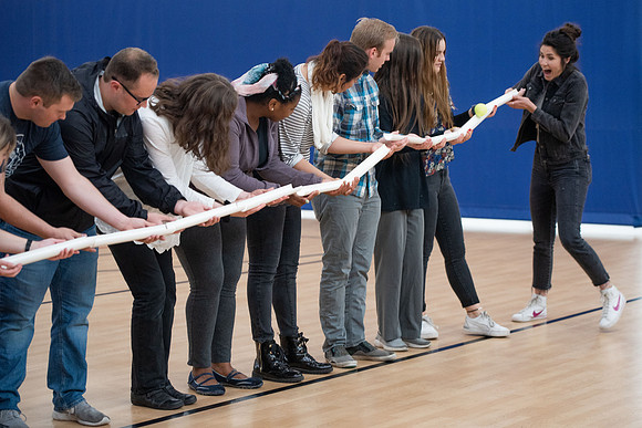 Student Support employees participate in team-building activities in the Hart Gym.