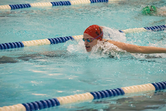 BYU-Idaho swimmers swim in the championship held in the Hart Building