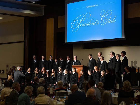 President's Club members enjoy an evening of socializing, musical entertainment and wonderful food in the Manwaring Center Ballroom.