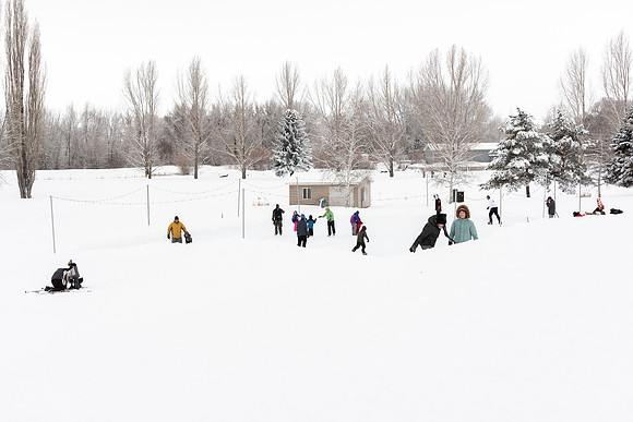 Volunteers and Community members enjoying Winter Fest at the Teton Lakes Golf Course.