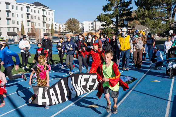 BYU-Idaho employees and their families enjoy a beautiful fall day at the stadium track.