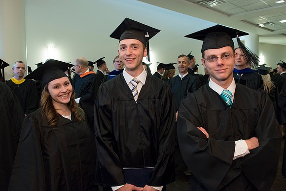Graduates gather and march in during the processional for April 2014 Graduation ceremonies in the BYU-Idaho Center.