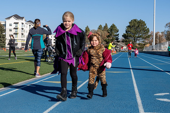 BYU-Idaho employees and their families enjoy a beautiful fall day at the stadium track.