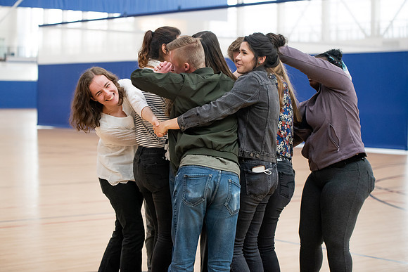 Student Support employees participate in team-building activities in the Hart Gym.