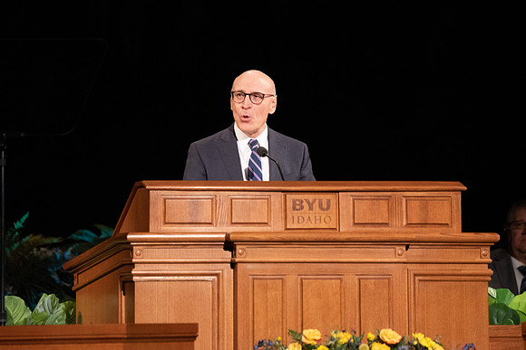 Elder Arnulfo Valenzuela of the Seventy speaks in devotional.
