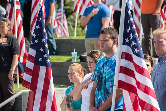 Flags on display in the Central Quad celebrate Constitution Day. "Remembering the brave men and women who gave so much for our Independance and the freedoms we now enjoy."