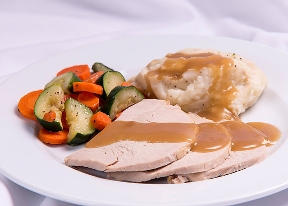 Food Service Catering Menu item. Roast Turkey, potatoes, gravy and vegetables.