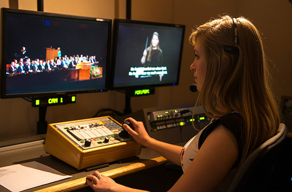 Behind the scenes of devotional: In the AV Camera Control room students run five mounted cameras in the BYU-I Center auditorium.