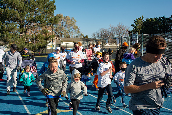 BYU-Idaho employees and their families enjoy a beautiful fall day at the stadium track.