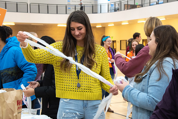 New Students get involved by doing different small service projects to start the semester.