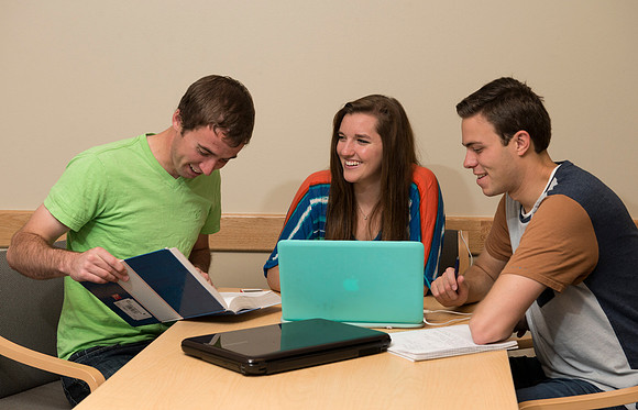 Students engage in an active study group for the new housing promo pictures.