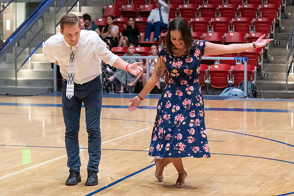 Students perform in a dance competition at the Hart Auditorium.