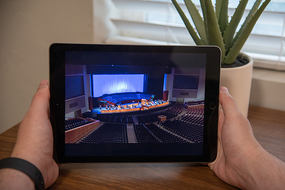 A BYU-Idaho Student watching the Spring Graduation Live Stream