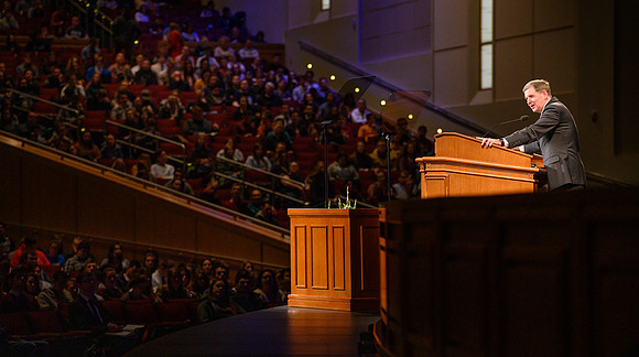 Elder James R Rasband of the Quorum of the Seventy speaks at devotional in the BYU-Idaho Center.