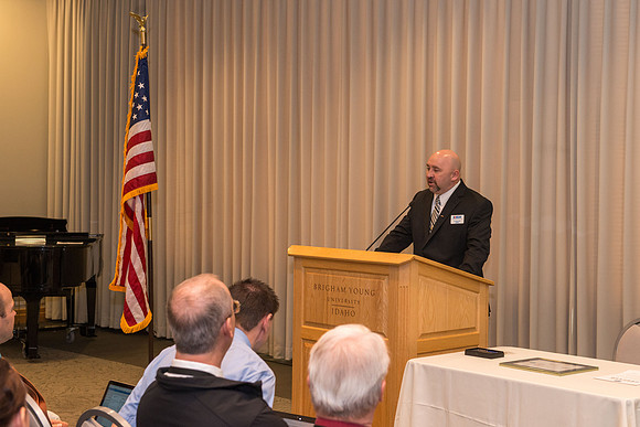 Todd Smith receiving an award on behalf of BYU-Idaho from the Office of the Secretary of Defense for the support BYU-Idaho has given to Peter Stilling while he has been serving in the Guard. Awarded b