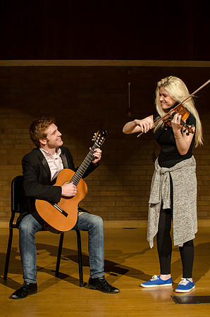 Students practice their music piece for their upcoming performance.