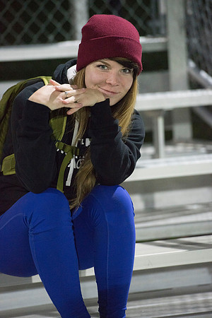 Students come to support their friends on the field.