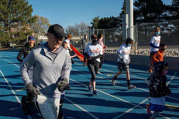 BYU-Idaho employees and their families enjoy a beautiful fall day at the stadium track.