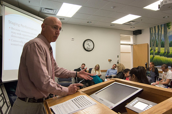 Brother Clay answers a student's question during class.