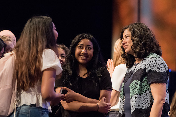Sister Reyna Aburto interacts with students after her devotional address.
