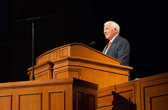 Brother Jan E. Newman giving a speech in the devotional.