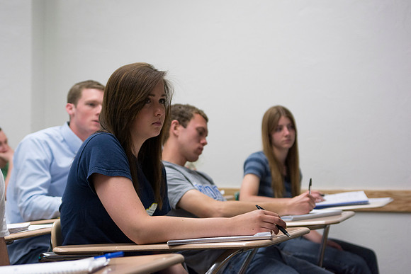 Students in Sister Christensen's Essentials of Human Nutrition class listen intently during the 2014 Spring Semester.