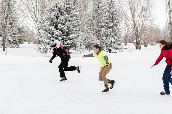 Volunteers and Community members enjoying Winter Fest at the Teton Lakes Golf Course.