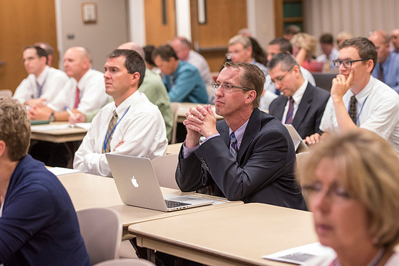 Faculty members come together in preparation of the new school year.