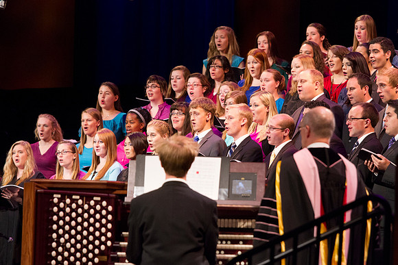 A musical selection, "Redemption Cometh" is sung by the Univesity Choir during the 2014 Spring Graduation Commencement.