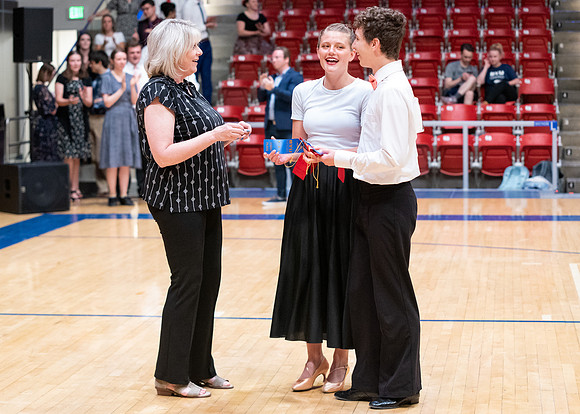 Students perform in a dance competition at the Hart Auditorium.