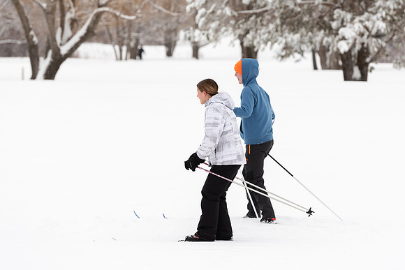 Volunteers and Community members enjoying Winter Fest at the Teton Lakes Golf Course.