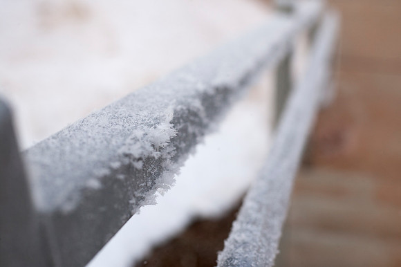 Frost on a hand rail by the Spori building.