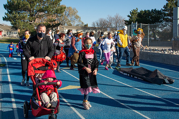 BYU-Idaho employees and their families enjoy a beautiful fall day at the stadium track.