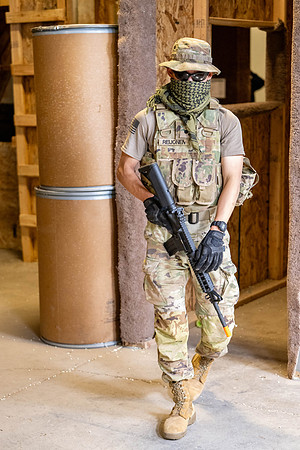 ROTC practices military tatics in an Advantage Airsoft facility.