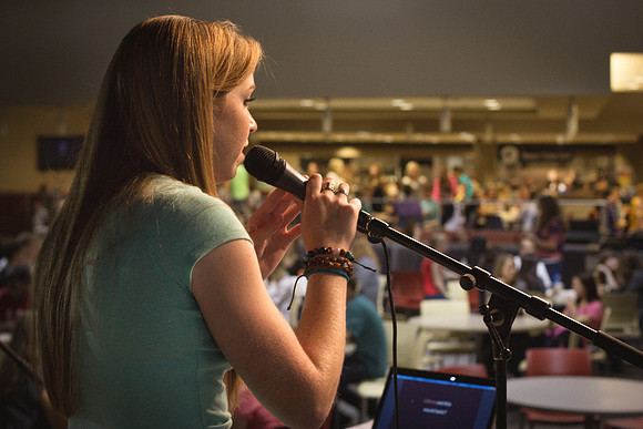 A girl sings karaoke during the BYU-Idaho i-Night Extravaganza.