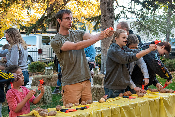 The Rexburg community celebrating the harvest of the potatoes through different activities at the Rexburg Tabernacle.
