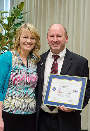 Todd Smith receiving an award on behalf of BYU-Idaho from the Office of the Secretary of Defense for the support BYU-Idaho has given to Peter Stilling while he has been serving in the Guard. Awarded b