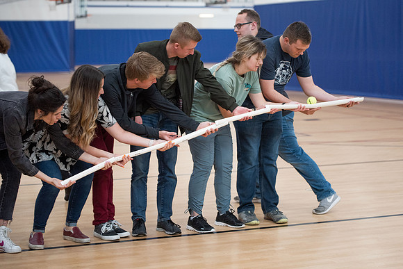 Student Support employees participate in team-building activities in the Hart Gym.