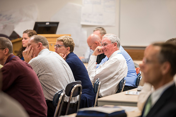 Faculty members come together in preparation of the new school year.