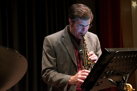 Mark Watkins on saxophone.