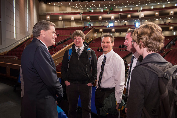 David L. Beck greets students after devotional in the BYU-Idaho Center.