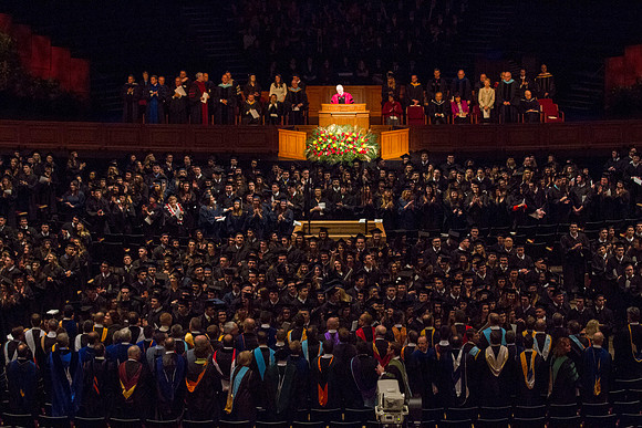 Students give thanks to their parents by applauding, during the Commencement Ceremony in the I-Center.