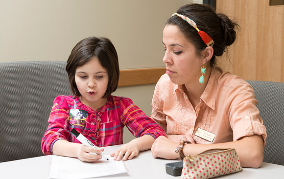 Teacher Education students offer their services tutoring kids 3rd grade to 12th grade. Kim Argueta tutoring Jenna Davis.