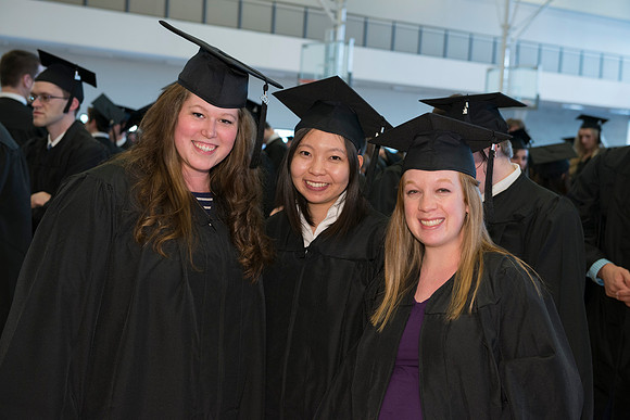 Graduates gather and march in during the processional for April 2014 Graduation ceremonies in the BYU-Idaho Center.