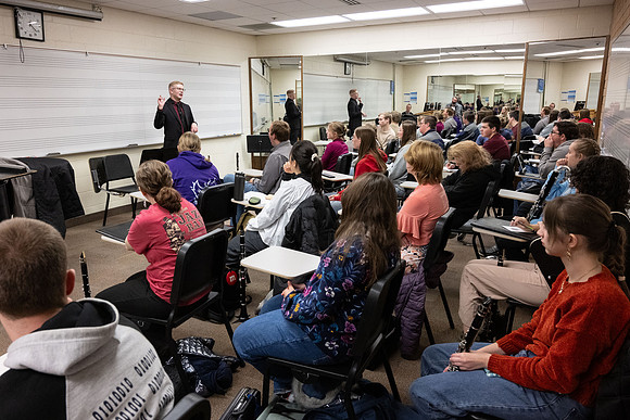 Members of the United States Marine Band work with students in a Masters class.