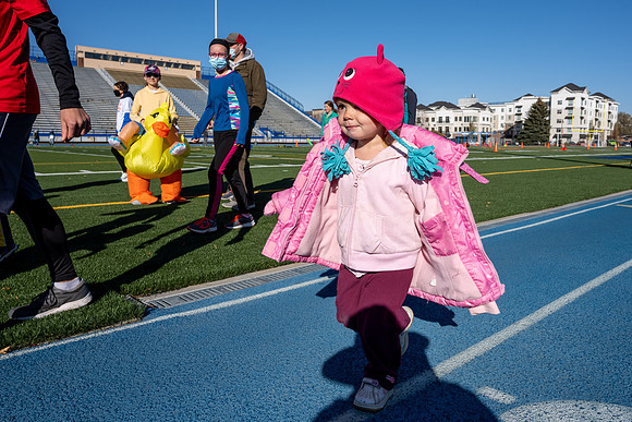 BYU-Idaho employees and their families enjoy a beautiful fall day at the stadium track.
