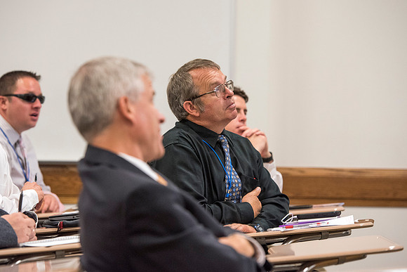 Faculty members come together in preparation of the new school year.