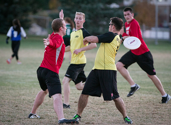 Teams compete during an Ultimate Frisbee game.
